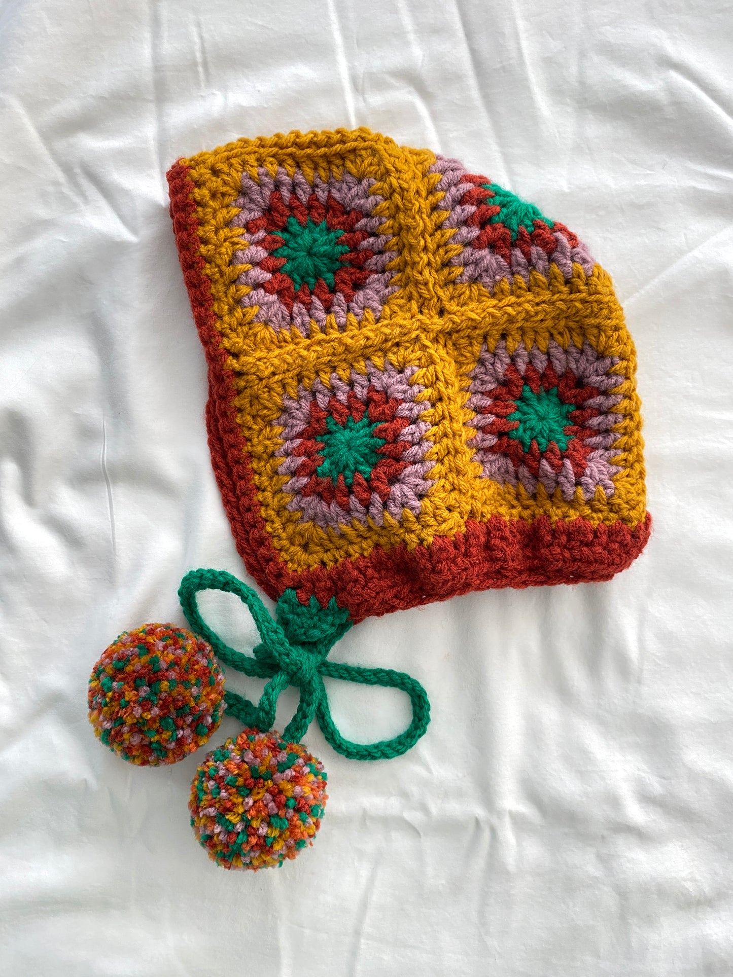 Poppy hand knitted Bonnet- Pumpkin 2/ 10T
