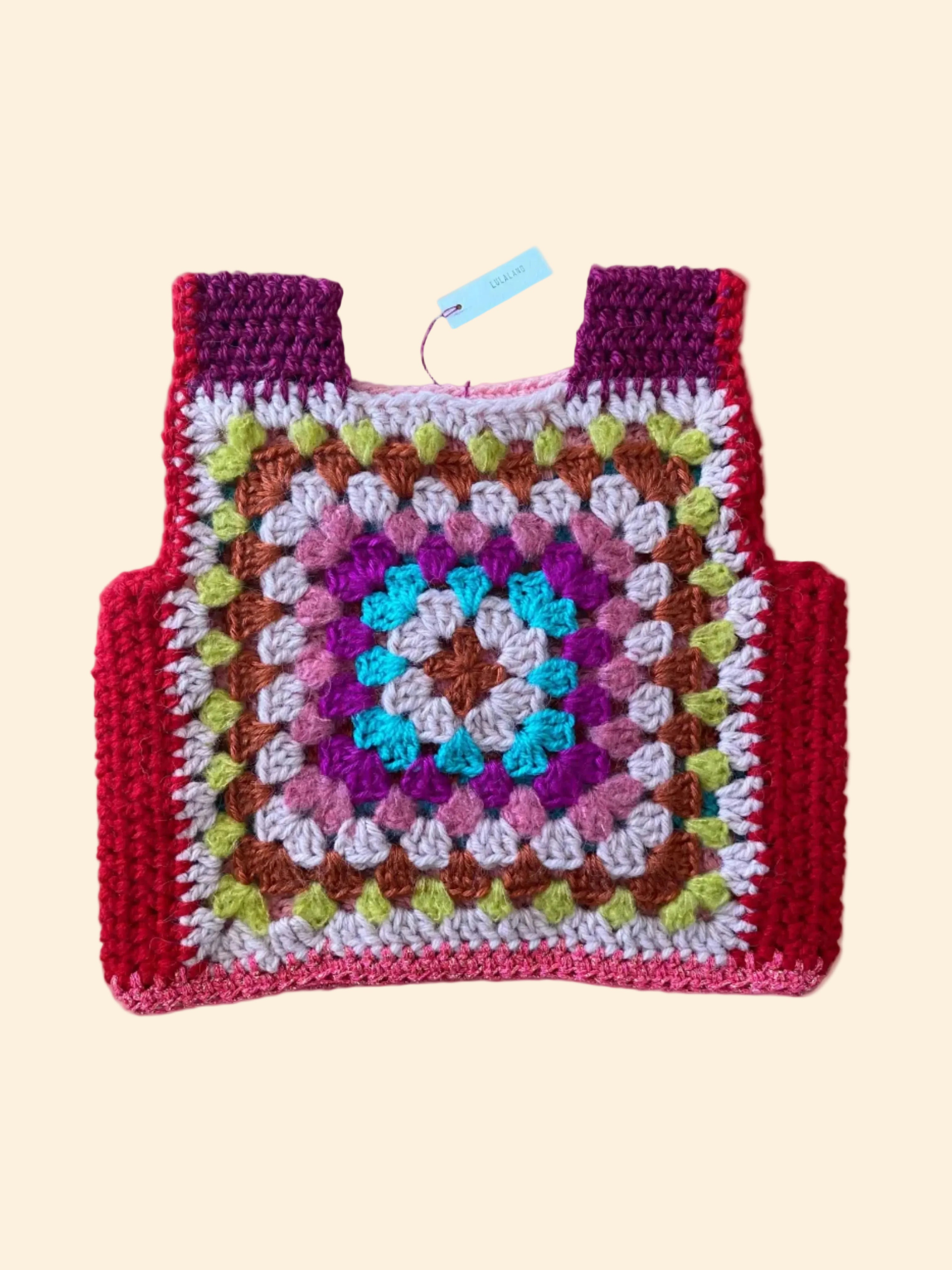 Colorful crocheted vest with a geometric pattern