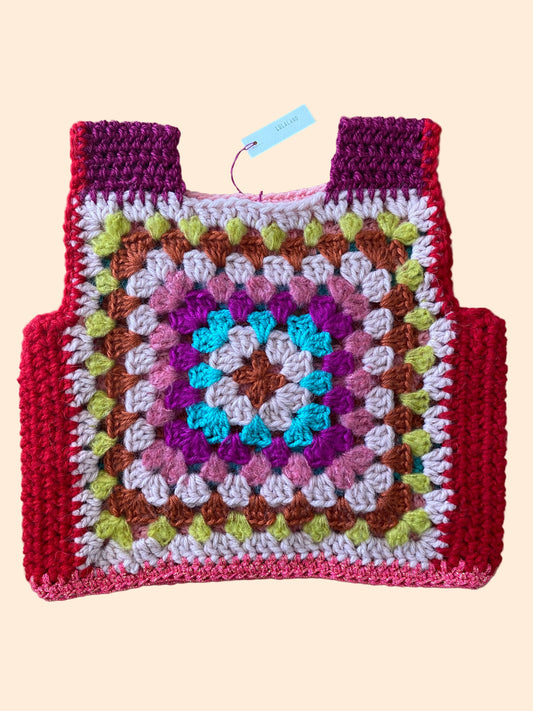Colorful crocheted vest with a geometric pattern