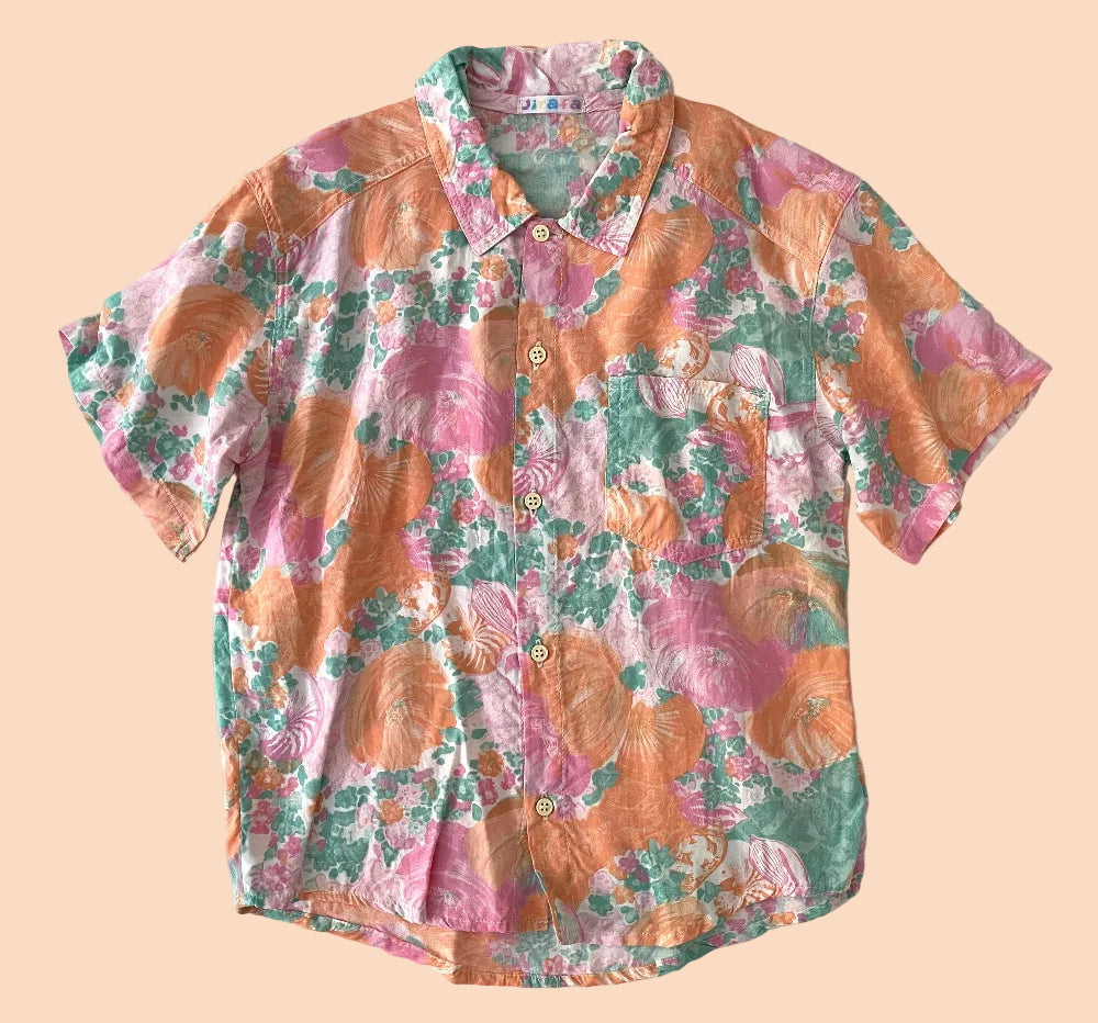 Floral patterned shirt on a beige background