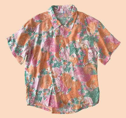 Floral patterned shirt on a beige background